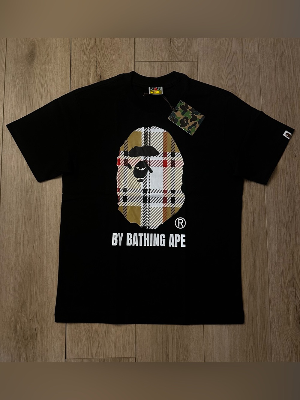 Bape Black Tee with Beige Plaid Ape Head Graphic